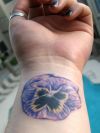 flower tats design on wrist.